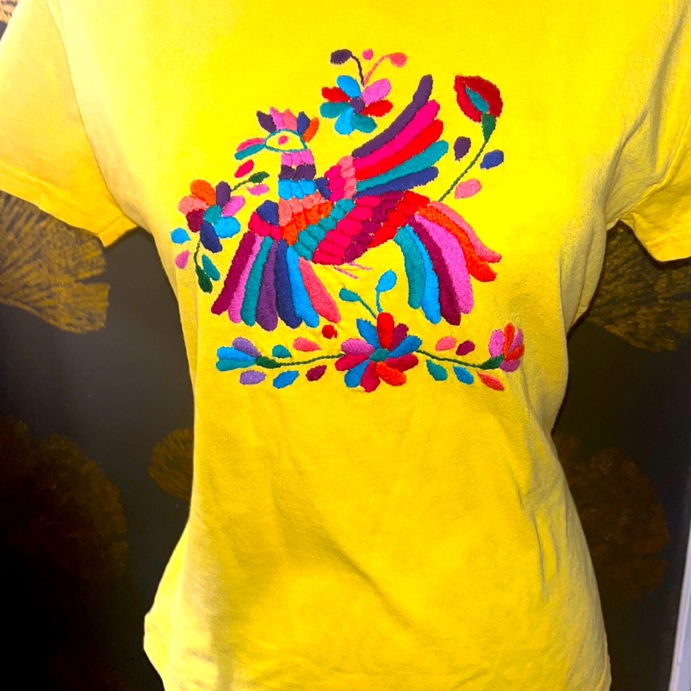 Embroidered yellow tee shirt